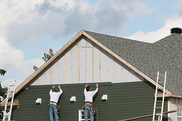Professional Siding Contractor technician working in Titusville, PA